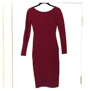 Wine color. Form fitted long sleeve dress w/ slit